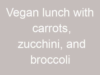 Vegan lunch with carrots, zucchini, and broccoli